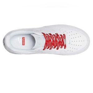 Nike x Supreme White Sneakers with Red Accents